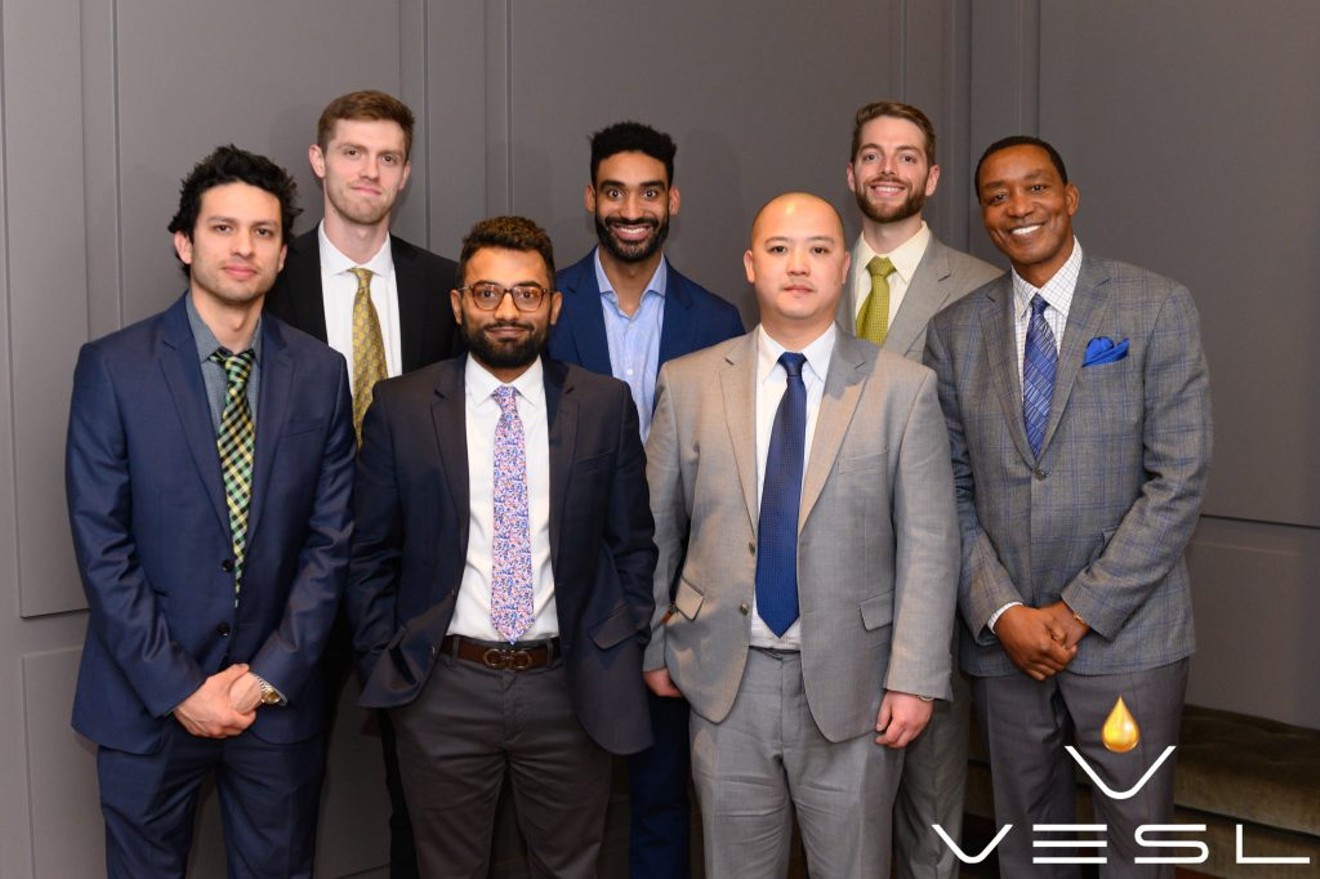 Isiah Thomas (far right) and the VESL team, including his son, Josh (middle of back row), and VESL CEO Bobby Scott (back row; far left).