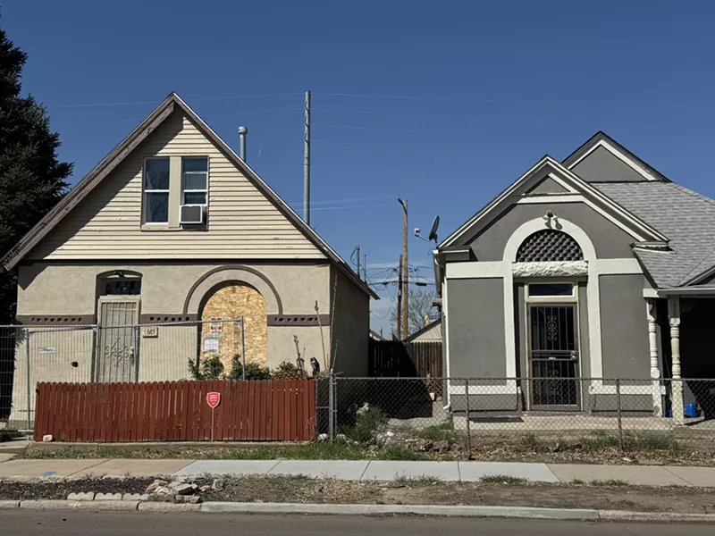 Image: vacant home next to occupied home in denver