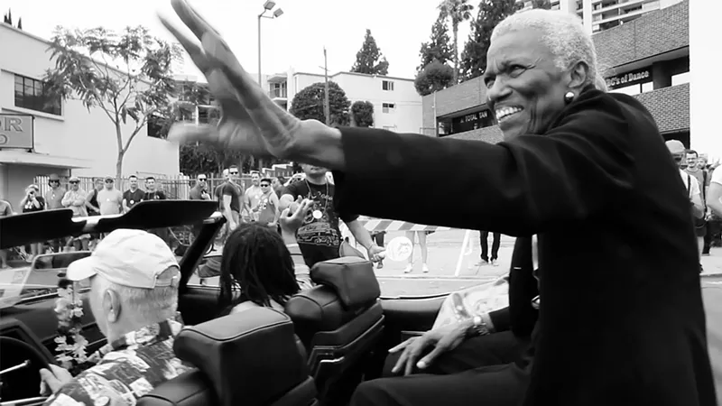 Image: Jewel Thais-Williams, the subject of the new documentary Jewel’s Catch One, waves while serving as grand marshal of the L.A. Pride Parade.