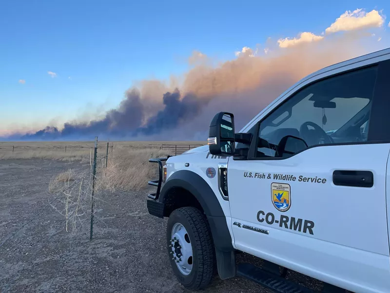 Image: U.S. Fish and Wildlife Service officials monitor the border of Rocky Flats National Wildlife Refuge.