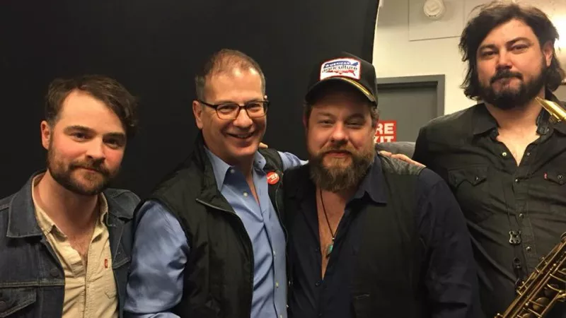 Image: Even before Stewart Vanderwilt, second from left, came to Colorado Public Radio, he already had a fondness for Colorado music, as seen in this March photo with Nathaniel Rateliff and members of the Night Sweats.