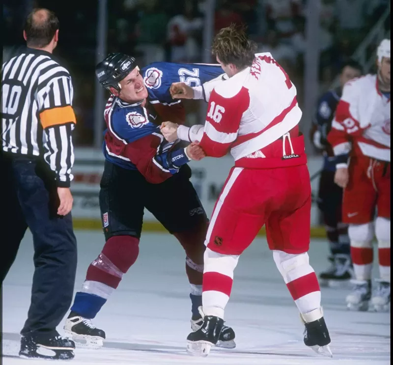 Image: Avs defenseman Adam Foote fights with Vladimir Konstantinov of the Detroit Red Wings during a 1997 playoff game.