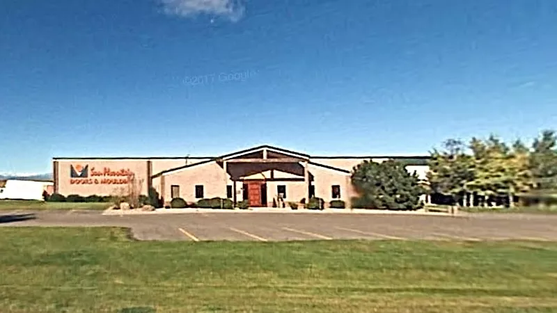 Image: The state health department has linked the death of a worker at Sun Mountain Custom Doors in Berthoud to a COVID-19 outbreak.