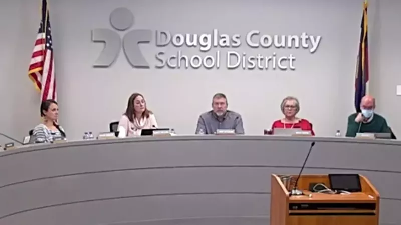 Image: Members of the Douglas County School Board as seen during a December 2021 meeting.