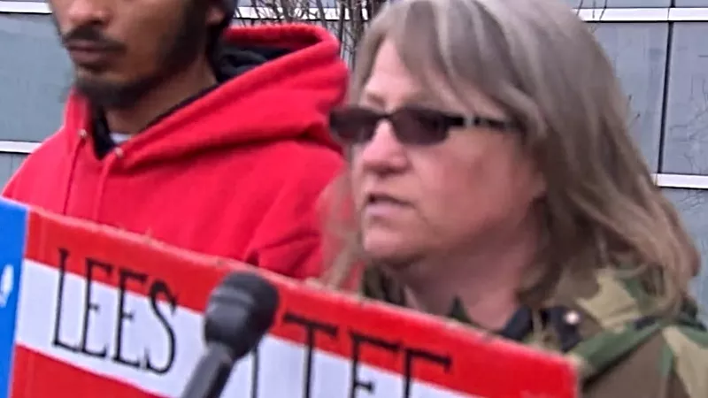 Image: Suzan Keltner, Lee Keltner's sister, protesting the decision to drop the prosecution of Matthew Dolloff.