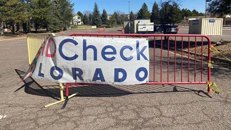 Image: A sign marking the COVID-19 vaccination site at Southwest Plaza.
