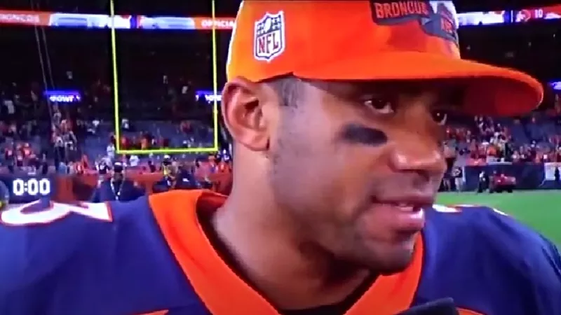 Image: Denver Broncos quarterback Russell Wilson in a post-game interview immediately following his team's 11-10 victory over the San Francisco 49ers on September 25.