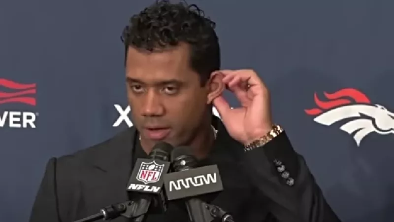 Image: Russell Wilson meets the media following the Broncos' 19-16 overtime loss to the Los Angeles Chargers on October 17.