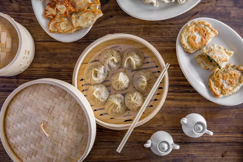 Image: a steam basket with dumplings