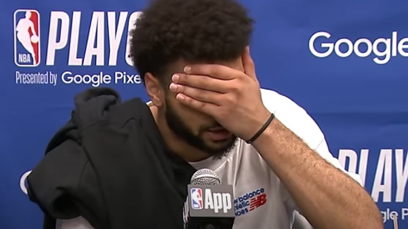Jamal Murray demonstrates how most fans watched the Nuggets' series-ending losses to the Minnesota Timberwolves.