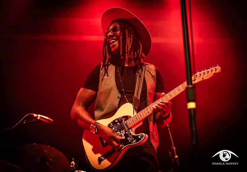 Image: man playing guitar
