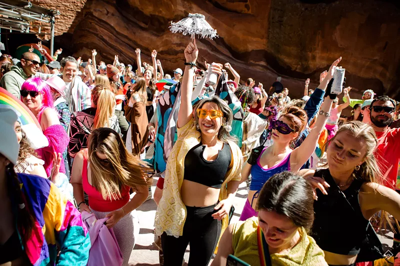 Image: People dance at Red Rocks.