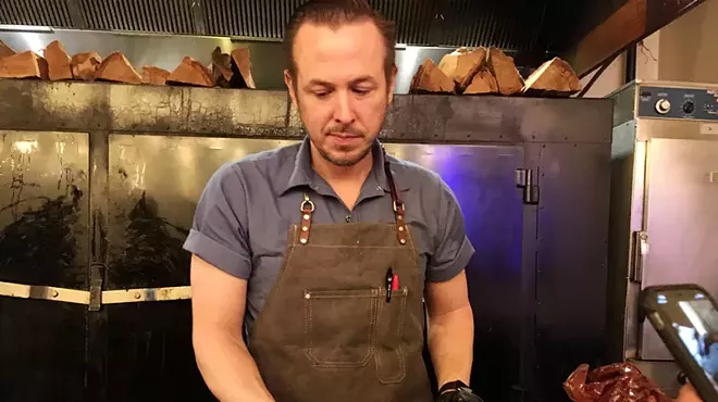 man with barbecue meat.