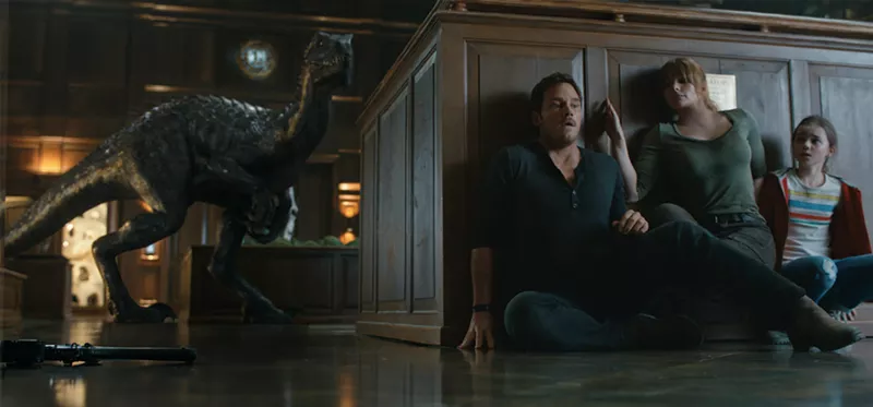 Image: A new hybrid dinosaur called the Indoraptor threatens Owen Grady (Chris Pratt), Claire Dearing (Bryce Dallas Howard) and Maisie Lockwood (Isabella Sermon) in Jurassic World: Fallen Kingdom.