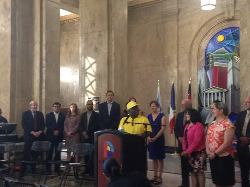 Image: Gary Miles spoke at a press conference about how he was able to stay in his home and evade eviction thanks to Colorado Legal Services.