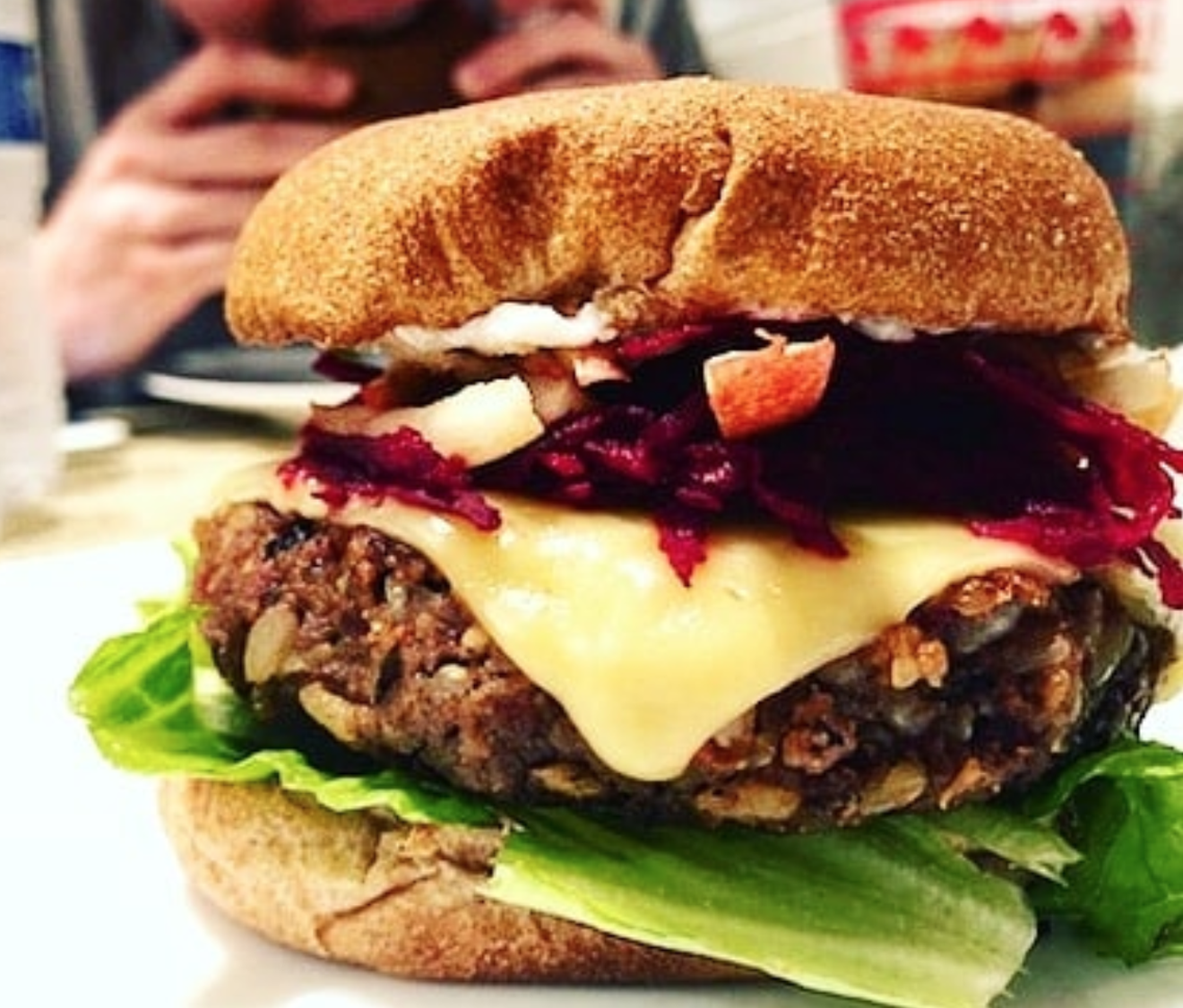 The Can't Beet This Burger is made with apples, grated beets, garlic basil aioli and vegan smoked gouda.