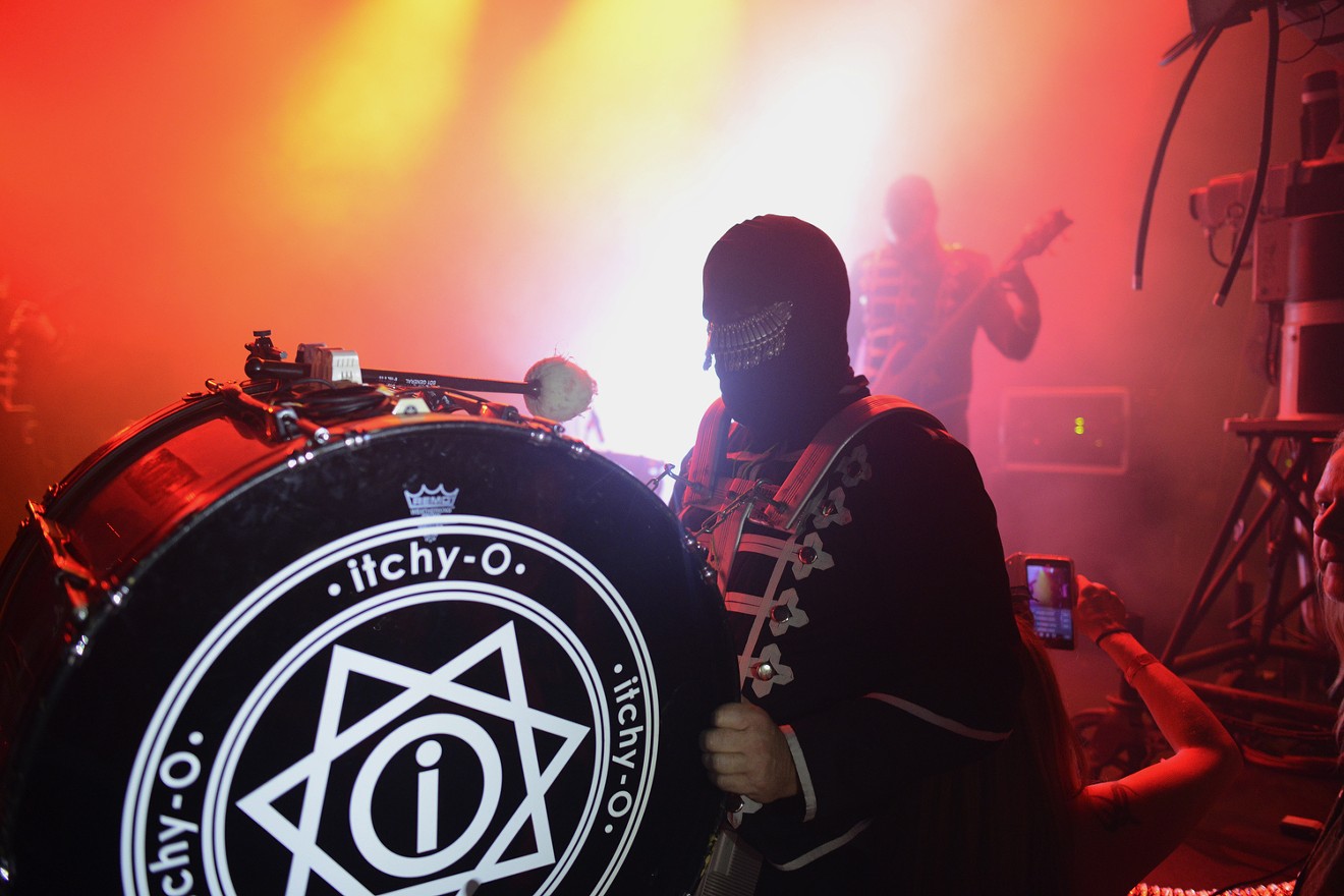 The masked musicians in Itchy-O will take over the Oriental Theater on New Year's Eve.