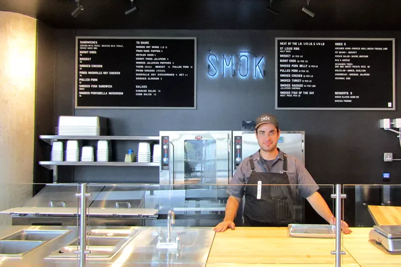 Image: Chef Bill Espiricueta behind the counter at Smok.