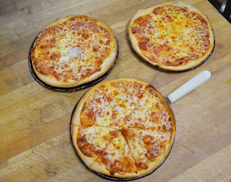 Image: Go retro with $1 pizza at Romano's fiftieth-birthday celebration.