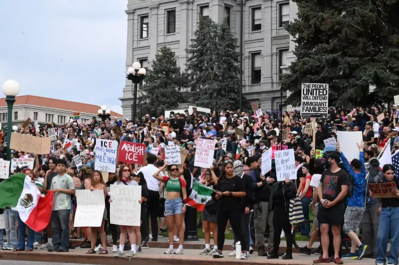 Image: Crowd of anti-ICE protesters on steps of Denver capitol