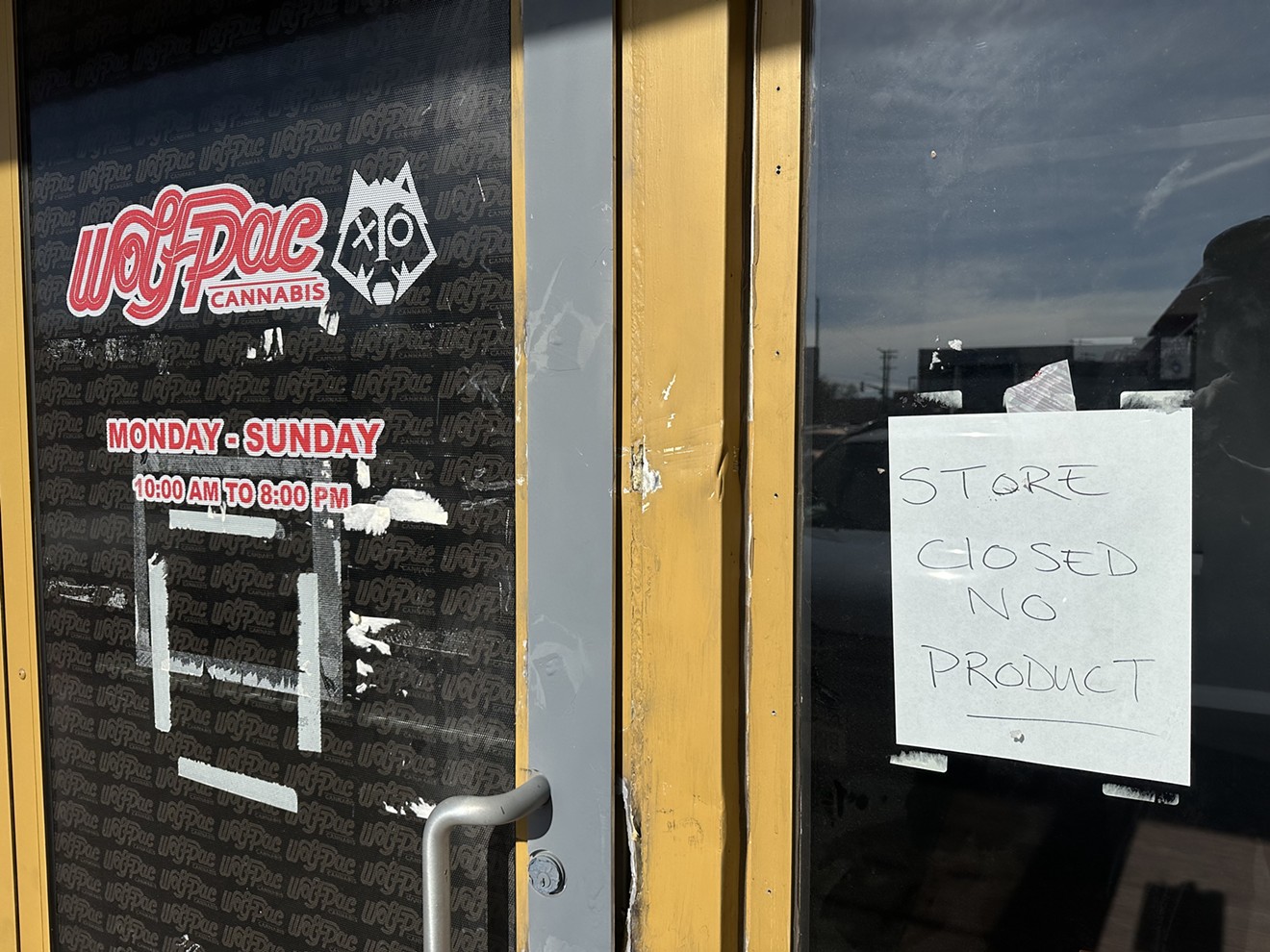 A sign outside of WolfPac's store at 2420 South Colorado Boulevard tells customer that the store is out of product.