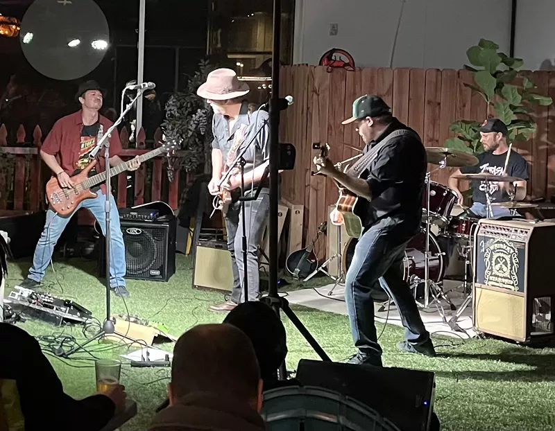 Image: band performing on stage