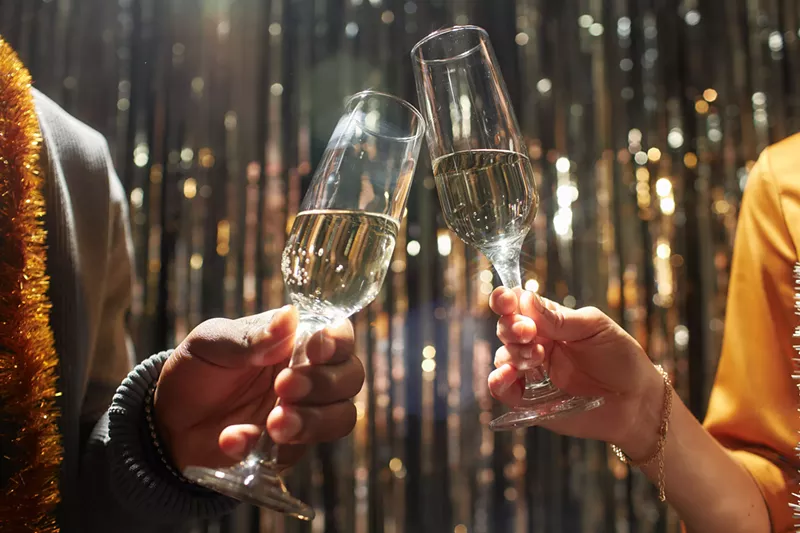 Image: champagne glasses clinking