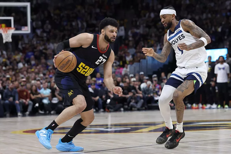 Image: Jamal Murray is guarded by Nickeil Alexander-Walker