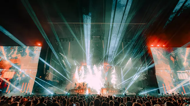 Odesza performing at Folsom Field