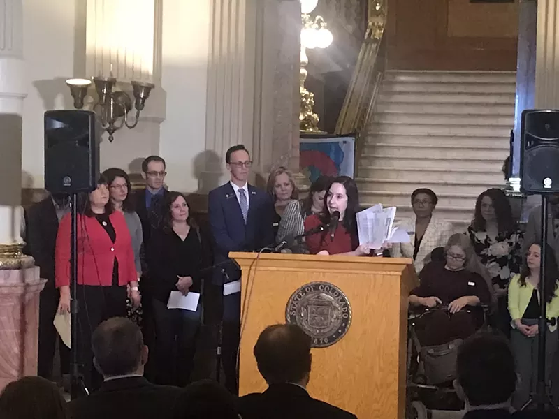 Image: The author talking about the public option at the Colorado Capitol in March 2020.