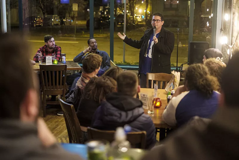 Image: Local comic Patrick Scott performs at the Denver Bicycle Cafe open mic.