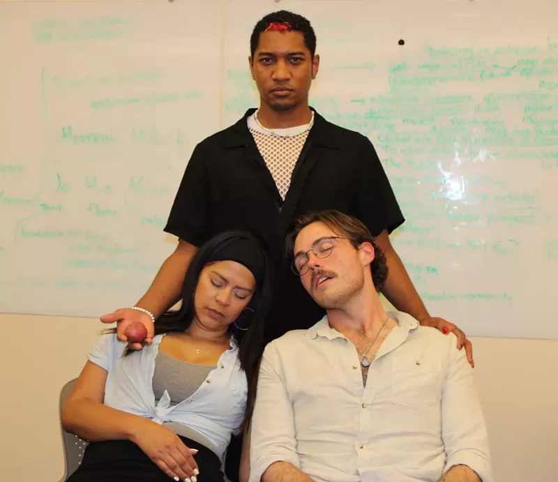 Image: Czarina Alexandra (Paola Miranda) and Czar Nicholas II (Frankie Lee) sleep in Rasputin's (Danté J. Finley) arms.