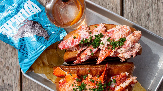 two lobster rolls on a tray