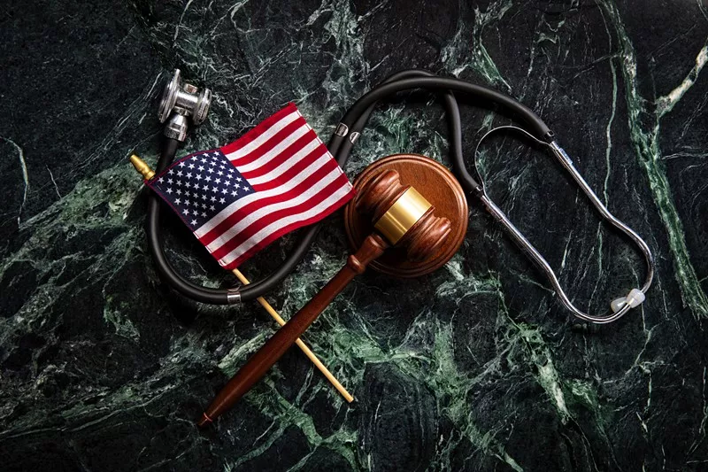 Image: flag, gavel stethoscope