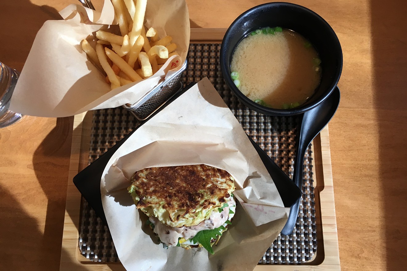 The Osaka burger comes with two sides of your choice, such as fries and miso soup.