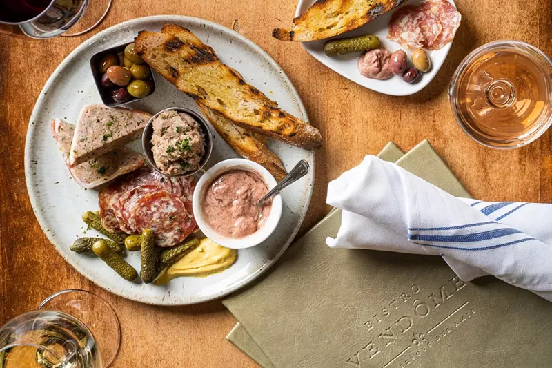 Image: An elegant French spread at Bistro Vendôme.