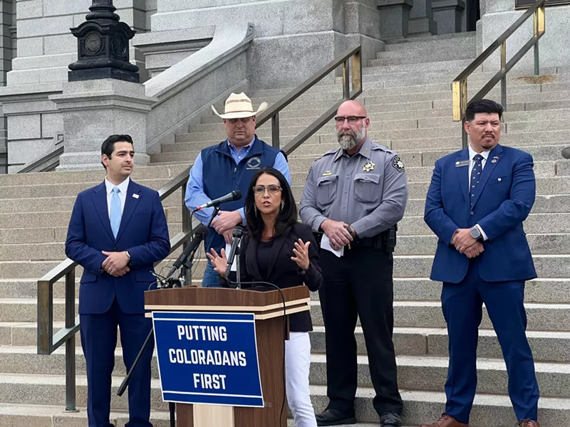 Image: Many Congressional hopefuls are signing up for the chance to take on U.S. Representatives Lauren Boebert (at podium) and Gabe Evans (far left) in 2026.