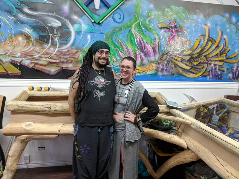Image: Boutique owner Jesse Taenzer and shop fairy Aspen Walkingstick, a wire wrapper, mala maker, painter and designer.