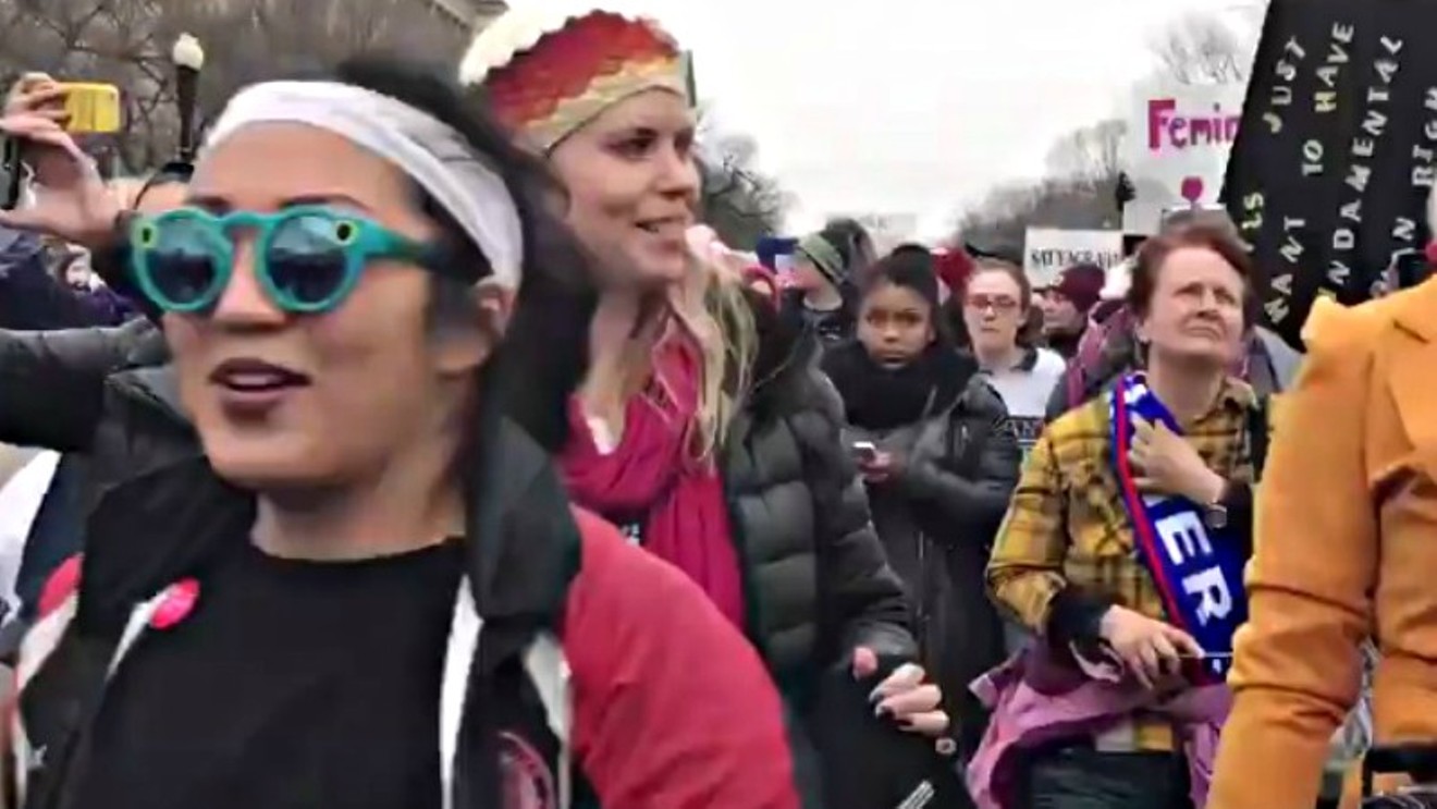 A screen capture from a video about a school-violence demonstration shared on the Women's March Facebook page.