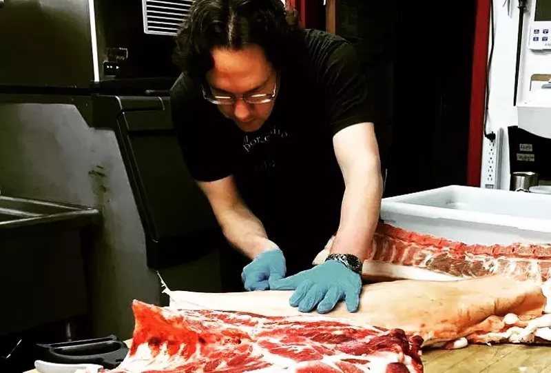 Image: Il Porcellino owner Bill Miner breaking down a hog.