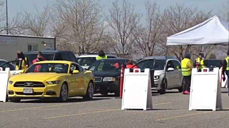 Image: The vaccination site at Dick's Sporting Goods Park reopened on April 11 after temporarily closing on April 7.