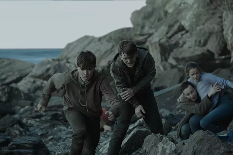 Image: Jonas Strand Gravli (middle) plays Viljar Hanssen, the brother of Torje Hanssen (Isak Bakli Aglen, left), both of whom survived the terrorist attacks that killed 77 people in Norway in 2011 as depicted in 22 July, directed by Paul Greengrass.