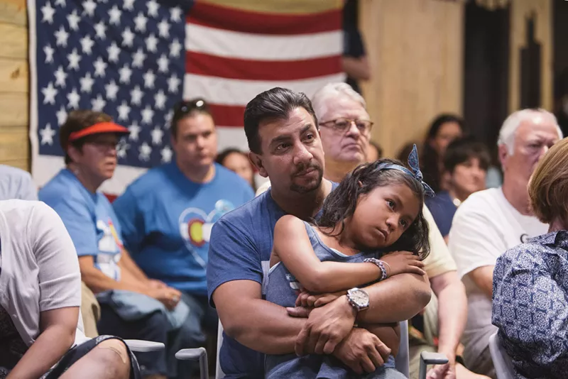 Image: Paul Lopez and his daughter, a DPS student.