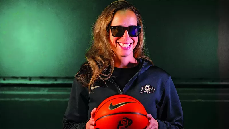 Image: woman in sunglasses with basketball