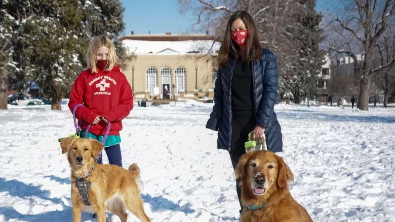 Image: Sydney Gilpin and Mary Francis, from left, with their dogs.