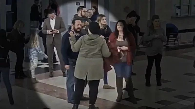 Image: A screen capture of Gazella Bensreiti speaking with a Pepsi Center security staffer after being stopped at an entrance on November 5.