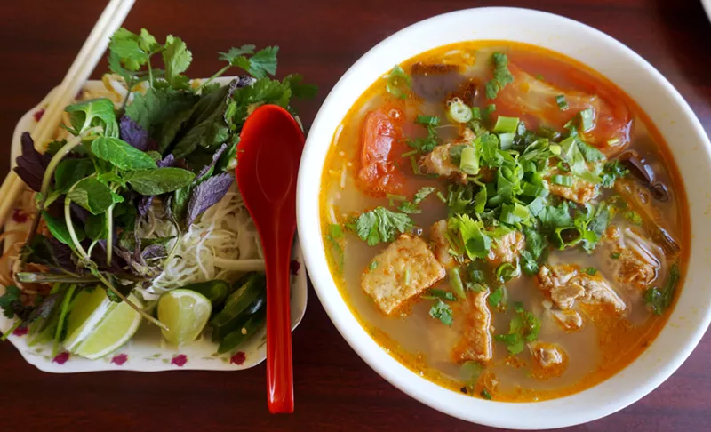 Image: Crab and pork soup at Pho Belmarasia comes in bold colors and flavors.