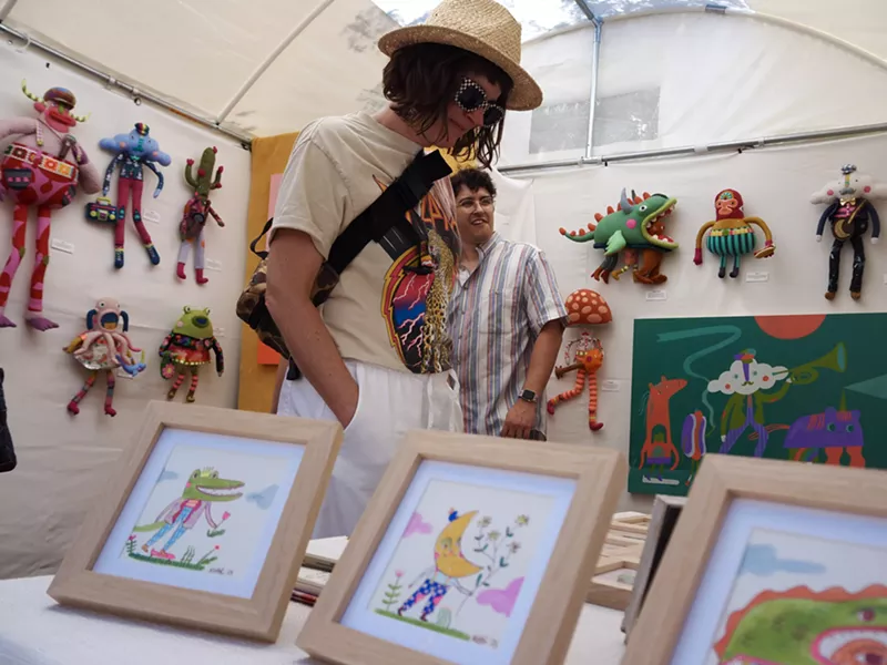 Image: A person browses art