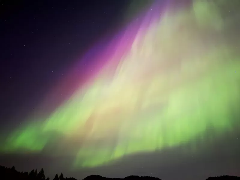 Image: A green and purple sky