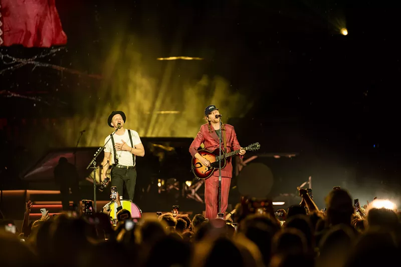 Image: The Lumineers on stage at Empower Field
